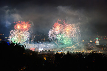 Panoramic view of Turin with fireworks at the feast of San Giovanni