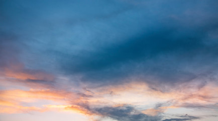 Beautiful bright sunset sky.  Dramatic colorful clouds after sunset. Nature backgrounds
