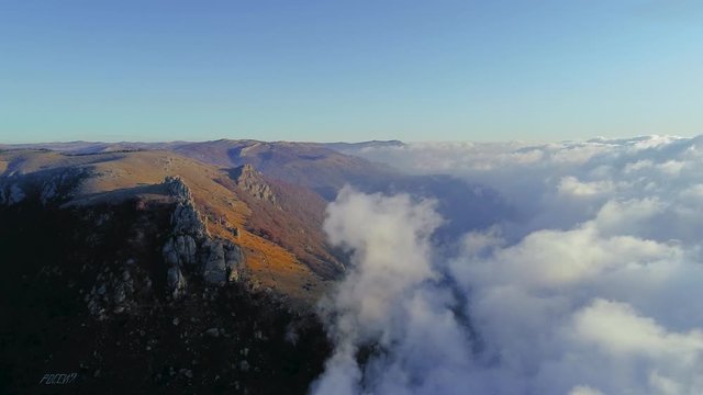 The canyon of Crimea is a popular place, fog, rocks in the clouds