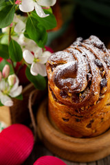 Easter cake kraffin. Kraffins with raisins, candied fruits and poppy seeds, sprinkled with powdered sugar. Close-up of homemade cake. Cruffin.