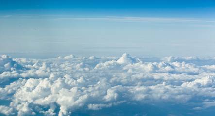 Clouds top view of the airplane. Heavenly landscape.