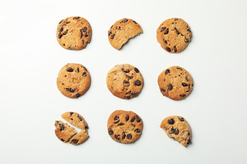 Flat lay with chocolate chip cookies on white background