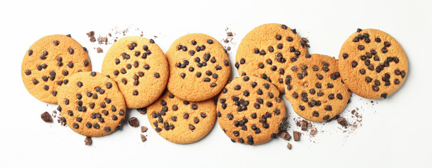 Tasty chocolate chip cookies on white background, top view