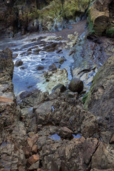 high tide at the rocky shore