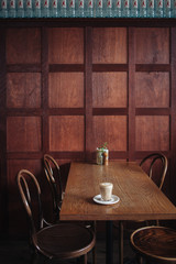 Cup of coffee in rustic cafe