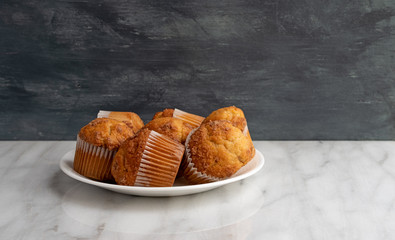 Banana Streusel muffins on a white plate