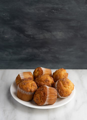 Banana Streusel muffins on a white plate