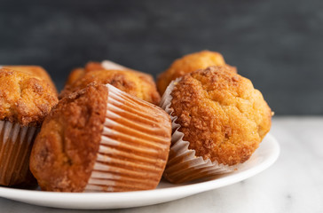 Banana Streusel muffins on a white plate