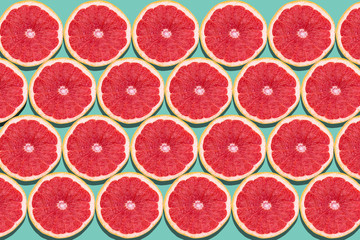 Seamless pattern with juicy kiwi and greapfruit on light blue background