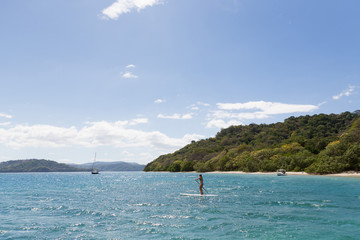 Female paddle boarding in Costa Rica. 