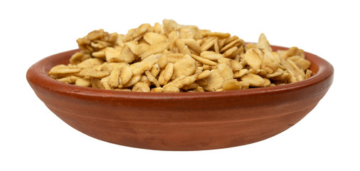 Side view of a bowl filled with brown sugar oat granola