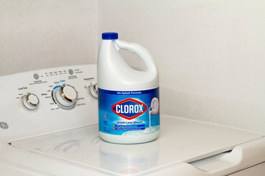 Victorville, CA / USA – April 29, 2020: A 3.62 quart container of Clorox bleach on a GE washing machine in a laundry room. 