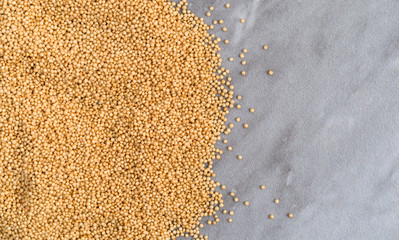 Organic amaranth seeds on a marble countertop