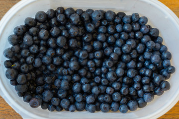 Top view of delicious blueberries in box