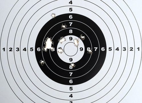 Paper target with pellet gun holes