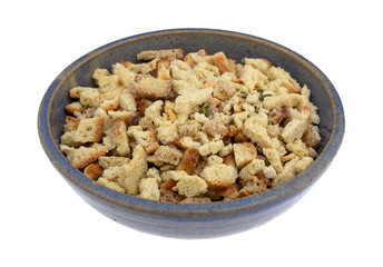 Bowl of stovetop stuffing on a white background