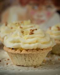 freshly baked and fluffy butter cream cupcakes with lemon juice taste