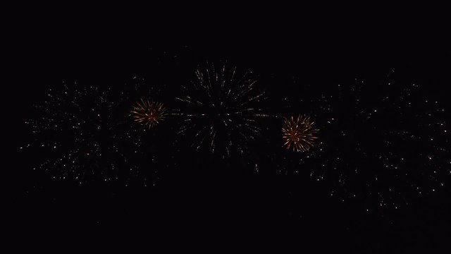 Fireworks in the night sky, isolated on black background