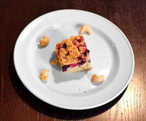 Piece of traditional Finnish blueberry pie on plate