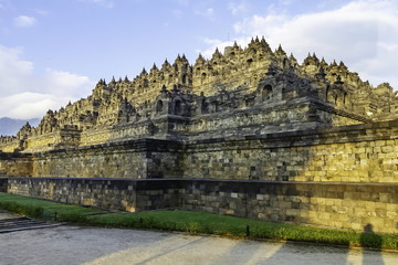 Fototapeta na wymiar Biggest Buddhist Temple, Pyramid monument of Borobudur in Central Java, Indonesia