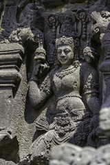 Fototapeta na wymiar Sculpted lady in pagoda of Prambanan Hindu Temple near Yogyakarta, Java island, Indonesia - 14/02/20