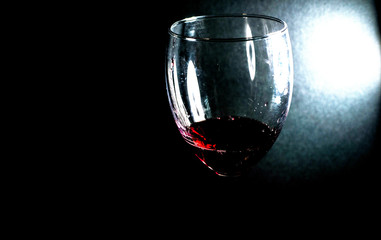 Pour red wine into a glass