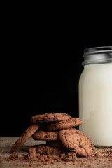 A view of some cookies and a glass of milk