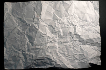 Crumpled embossed piece of paper