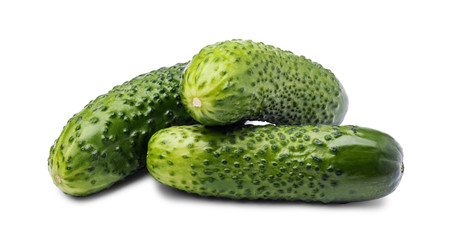 Three fresh cucumbers isolated on white background.