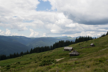 Fototapeta na wymiar Small houses in the mountains