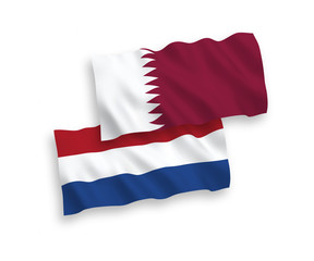 Flags of Qatar and Netherlands on a white background