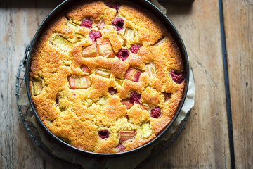 Orange cake with raspberries and rhubarb 