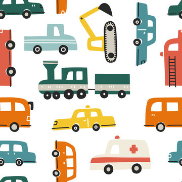 Seamless pattern with different cars. Hand drawn vector illustration for kids textile or nursery wallpaper design