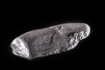 Rhodium nugget, chemical element with Rh symbol, metal for industrial use, used in jewelry and automatic equipment.