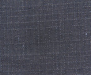 Dark blue fabric background with spots. The texture of the fabric in the perpendicular lines.