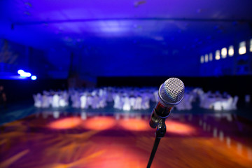 Microphone on stage, in an empty room before the event