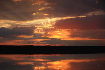 Fototapeta premium fiery sunset on the lake