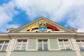 golden crest at a gable of a historic building in Stralsund, Germany