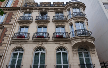 Fototapeta premium Traditional French house with typical balconies and windows. Paris.