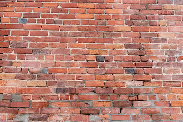 Old Red Brick Wall with Damage and Variation