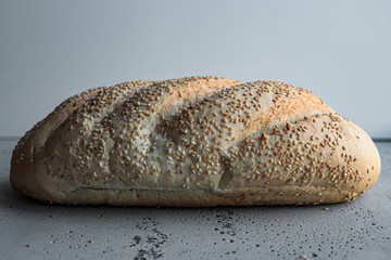 Аreshly baked slice of bread with sesame seed