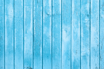 Fototapeta na wymiar Pastel blue background. Weathered wooden texture of old building. Toned image