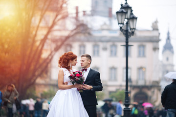married couple hugging, wedding couple hugging, bride and groom, romantic married couple at sunset,