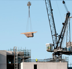 Building series. Working crane on the new Multistory Unit building under construction at 277 Mann St. Gosford. February 29, 2020.