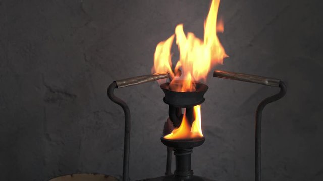 Flame in the nozzle of an old kerosene primus