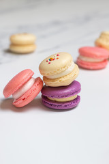 Obraz na płótnie Canvas Macarons - Pink, Purple, and White