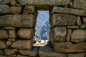 Stone window at Macchu Picchu city, amazing arquitecture