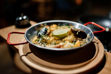 Grilled octopus in seafood restaurant on ceramic main dish