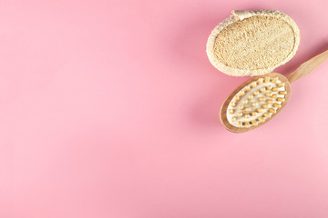 Natural Sisal washcloths, eco-friendly massage anti-cellulite brush, liquid soap in a red bottle with a dispenser, on a pink background, top view