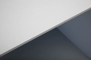angular abstract background with shades of white and gray colors